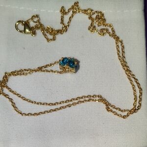 Elegant Gold Necklace with Blue Gemstones